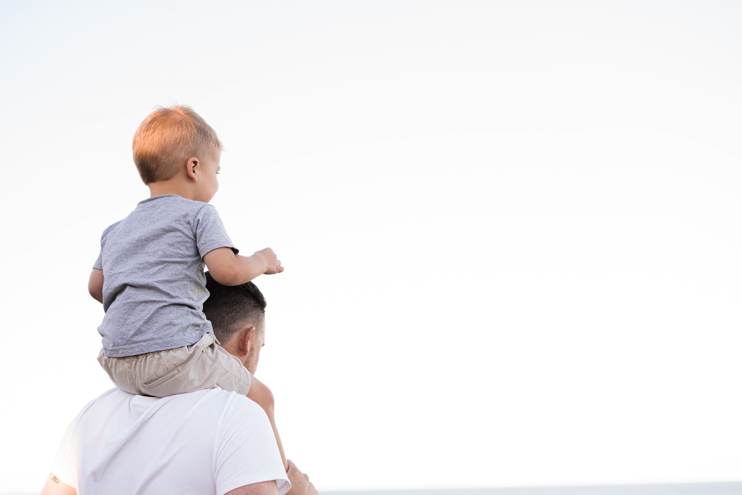 Child on Father's Shoulders