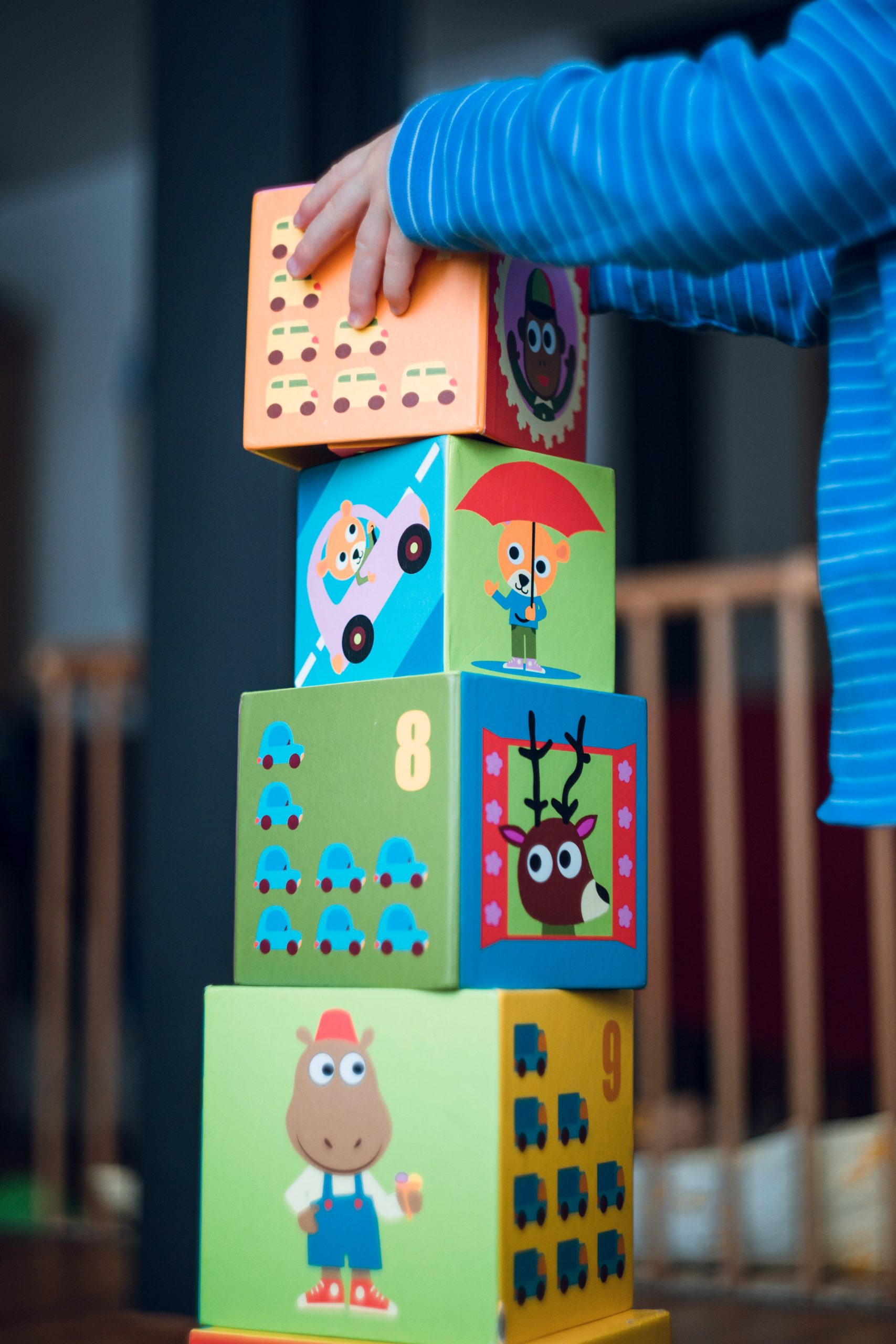 Child and Colorful Blocks