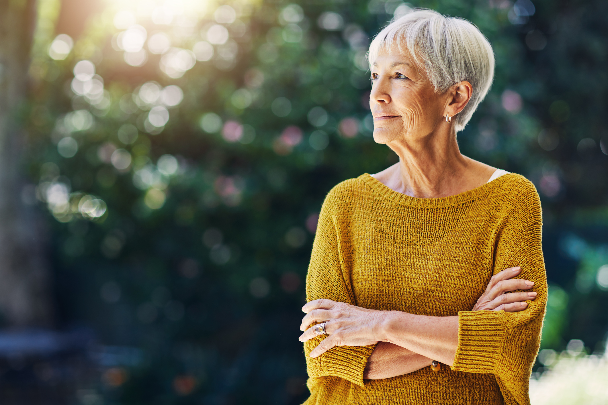 Shot of a confident senior woman looking thoughtful outdoors